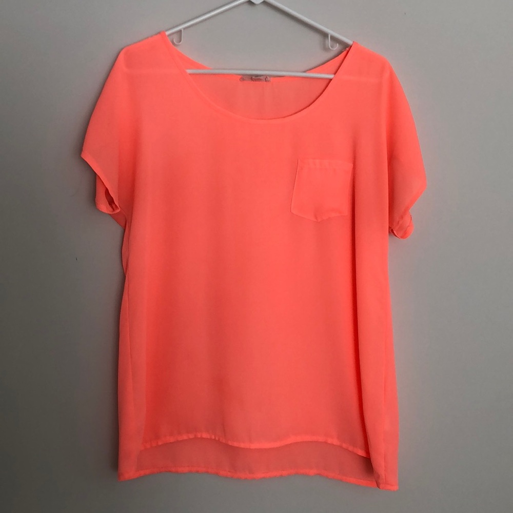 Bright orange top